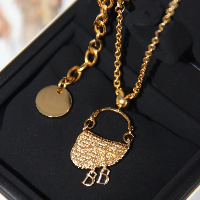 YISON フランス製高級金メッキ、サドルバッグ型ペンダント - Luxury Bags For Women Sale のレビューと価格